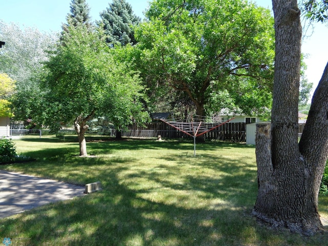 view of yard with fence