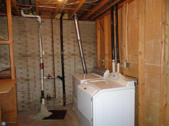 laundry room featuring laundry area and separate washer and dryer