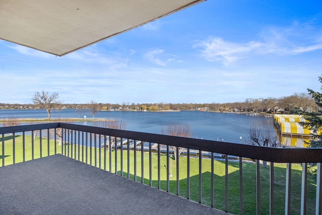 balcony featuring a water view