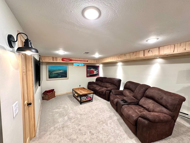 carpeted living area with visible vents, a textured ceiling, and baseboards