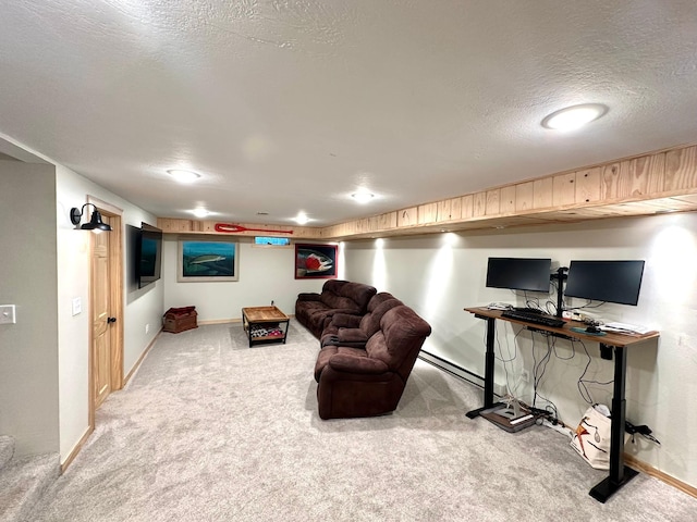 living room with carpet floors, a textured ceiling, and baseboards