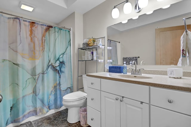 full bath with curtained shower, vanity, and toilet