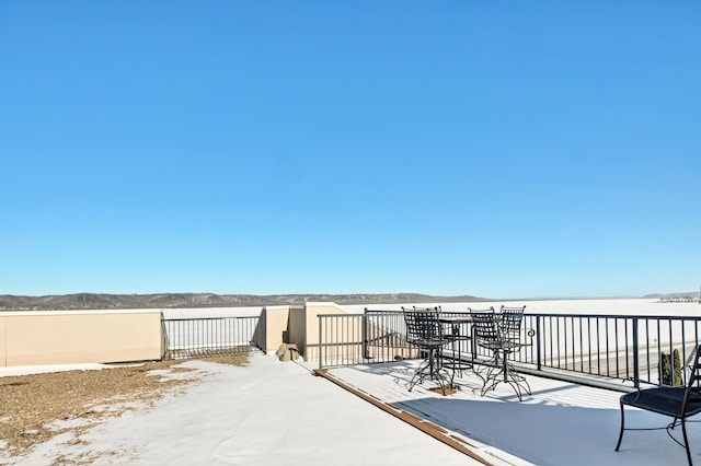 view of snow covered patio