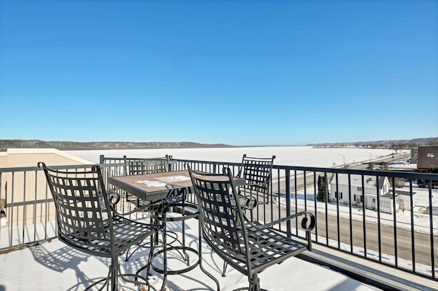 view of snow covered deck