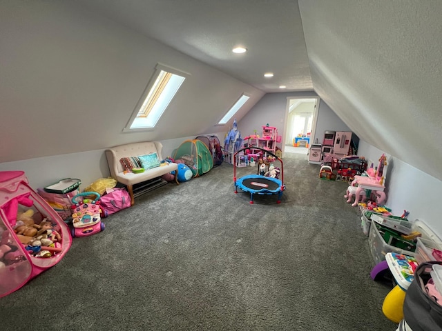 recreation room with lofted ceiling, a textured ceiling, carpet flooring, and recessed lighting