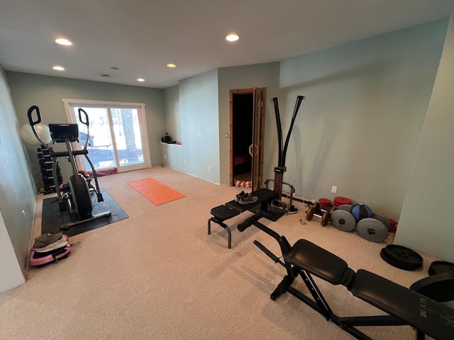 exercise area with carpet flooring and recessed lighting