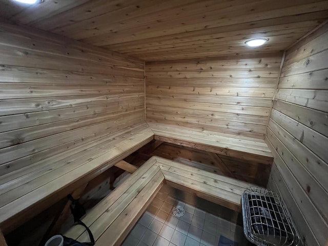 13849 Leaf River Rd, Wadena, MN 56482 - sauna featuring tile patterned floors, wood walls, and wood ceiling