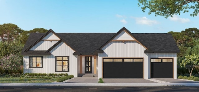 view of front of home featuring an attached garage and decorative driveway