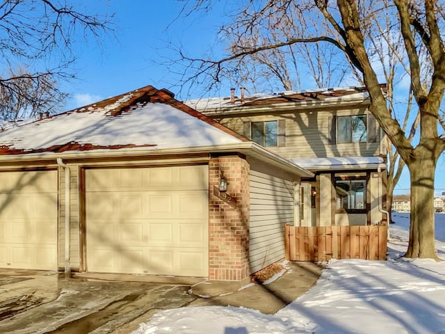 view of front of property featuring brick siding