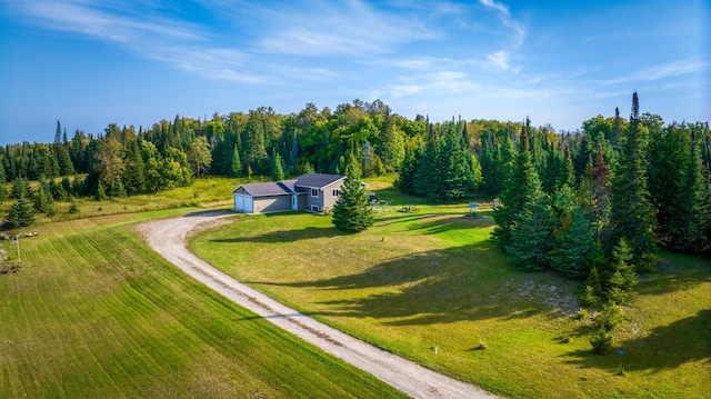 aerial view featuring a view of trees