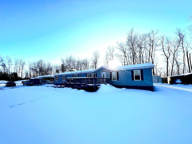 view of front of property featuring a deck