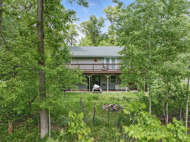 11288 Leewood Ln, East Gull Lake, MN 56401 - rear view of property with a deck, a patio area, and a shingled roof