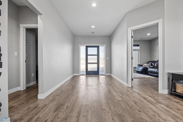 entrance foyer featuring recessed lighting, baseboards, and wood finished floors