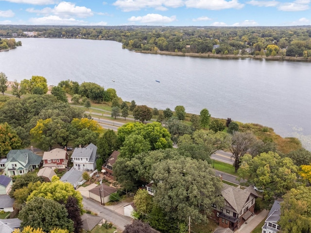 bird's eye view featuring a residential view and a water view