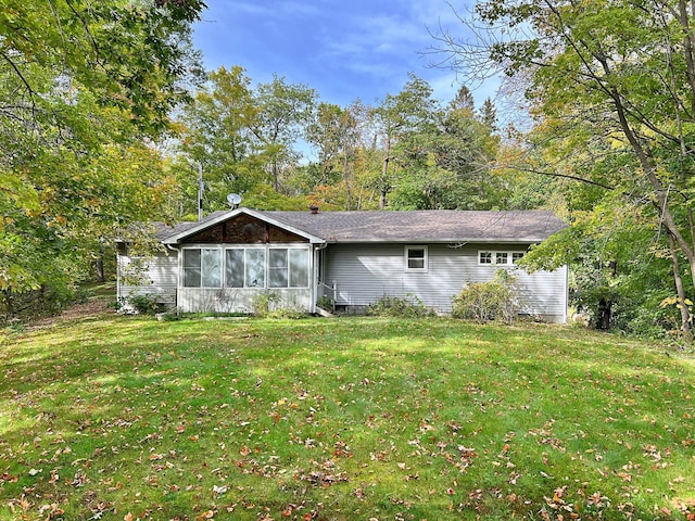 view of front of property with a front lawn