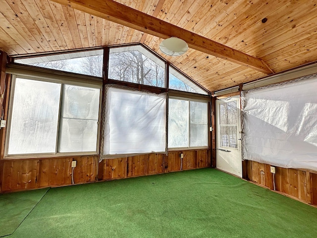 unfurnished sunroom featuring vaulted ceiling with beams and wooden ceiling