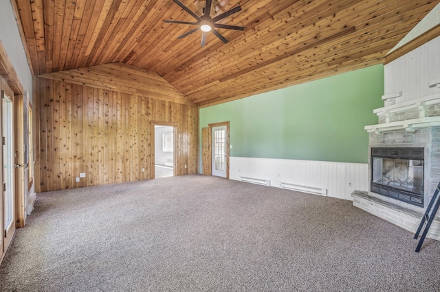 unfurnished living room with wooden ceiling, a baseboard radiator, a fireplace, carpet flooring, and vaulted ceiling