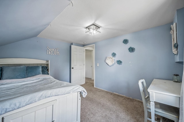 bedroom featuring lofted ceiling and light colored carpet