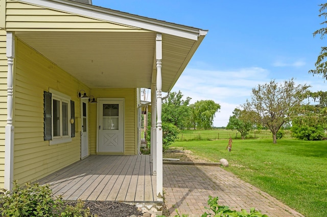 view of patio / terrace featuring fence