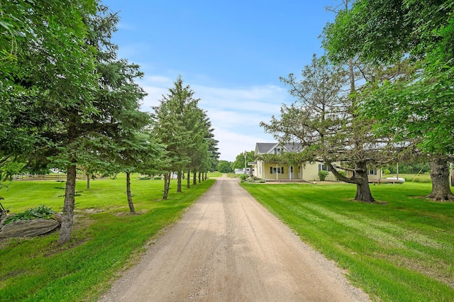 view of road with driveway