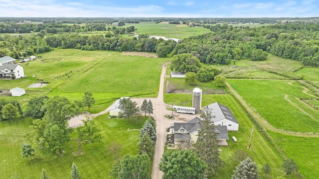 birds eye view of property featuring a rural view