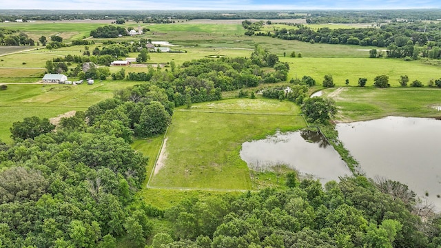 drone / aerial view featuring a rural view and a water view