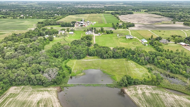 aerial view with a rural view and a water view