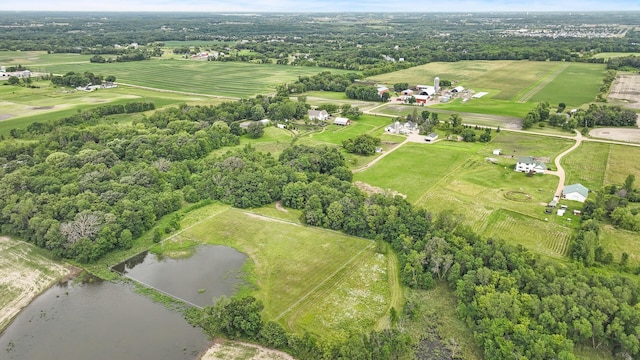 drone / aerial view with a rural view and a water view