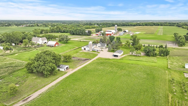 birds eye view of property featuring a rural view