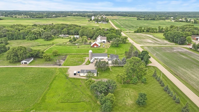 birds eye view of property featuring a rural view