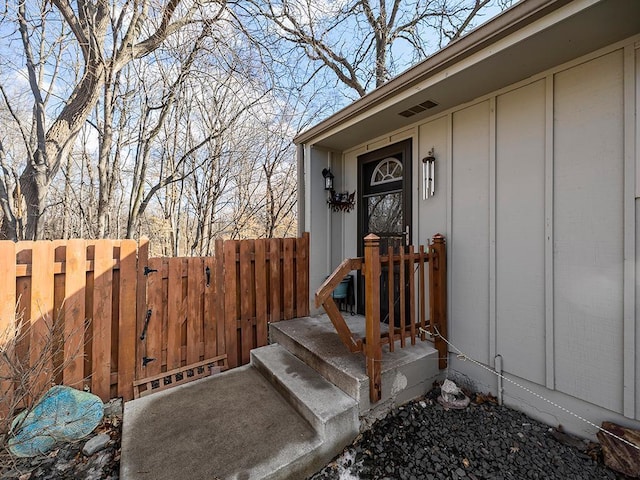 property entrance with fence