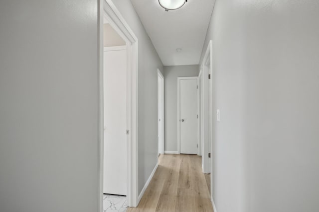 hallway with baseboards