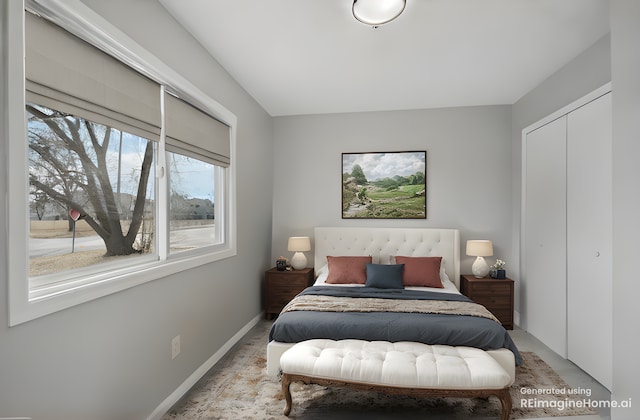 bedroom with baseboards and a closet