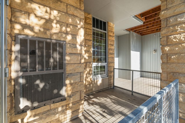 entrance to property with stone siding