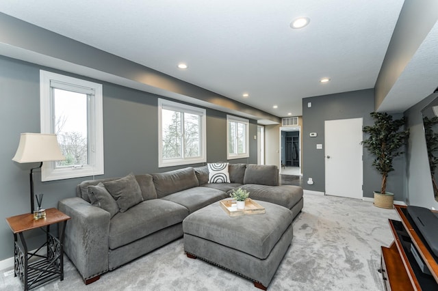 1509 Woodland Dr SW, Rochester, MN 55902 - living area with recessed lighting, baseboards, light colored carpet, and visible vents