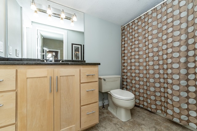 1509 Woodland Dr SW, Rochester, MN 55902 - full bath featuring vanity, a textured ceiling, a shower with shower curtain, and toilet