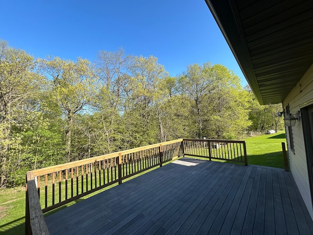 16110 Giefer Ave, Nerstrand, MN 55053 - wooden deck with a lawn and a view of trees