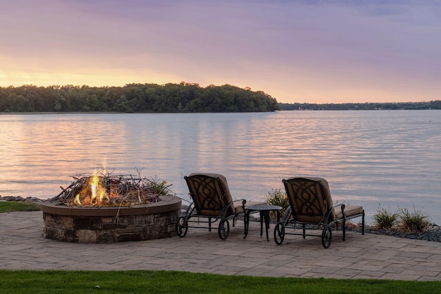 water view with an outdoor fire pit