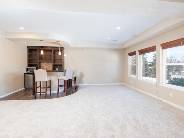 kitchen with carpet, baseboards, and recessed lighting