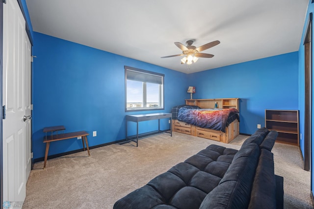 bedroom featuring carpet floors, baseboards, and a ceiling fan