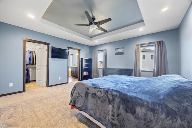 530 Piper St, Kindred, ND 58051 - carpeted bedroom with baseboards, a spacious closet, recessed lighting, and a tray ceiling