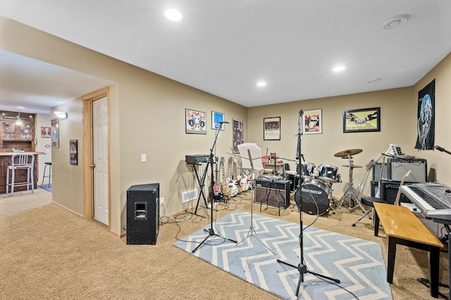 workout room featuring light carpet, baseboards, a dry bar, and recessed lighting