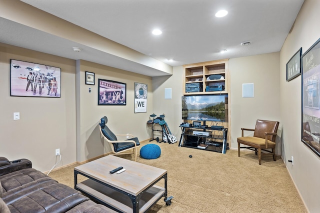 living area with baseboards, carpet, and recessed lighting