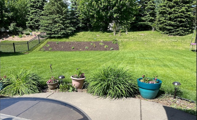 view of yard with a patio and fence