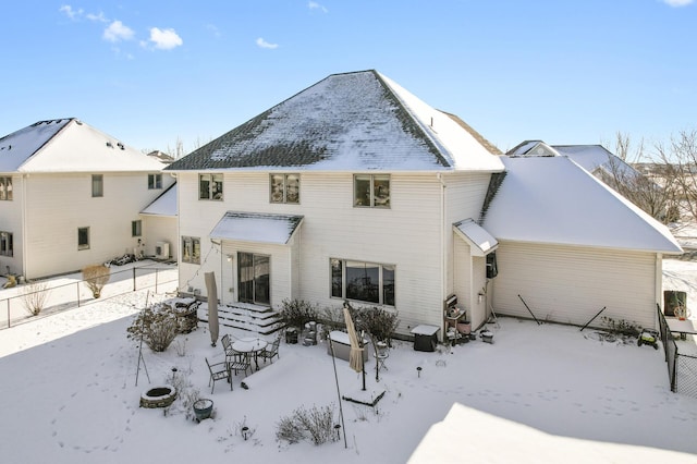 view of snow covered property