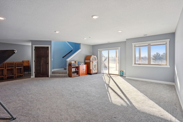 living area featuring stairway, recessed lighting, carpet flooring, and baseboards