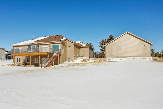 exterior space with stairs and a deck