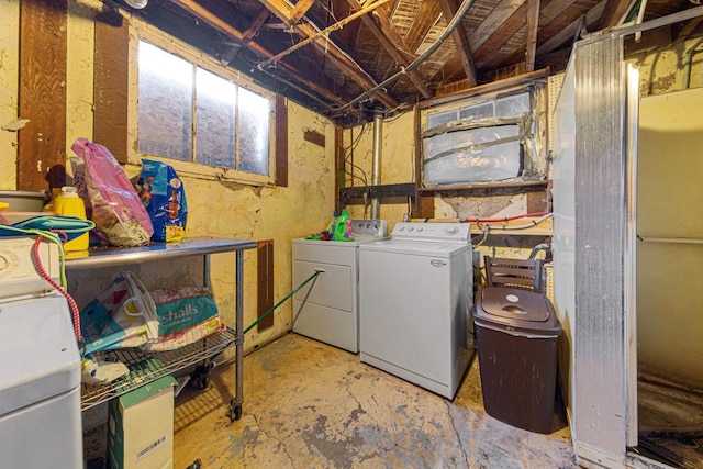 washroom with laundry area and washing machine and clothes dryer