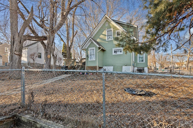 view of front of house with a fenced backyard