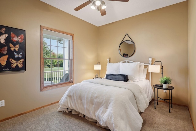 bedroom featuring ceiling fan, carpet, and baseboards